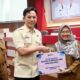 Bupati Lampung Selatan Serahkan Gajih Ke 13 ASN dan Launching Gajih THLS